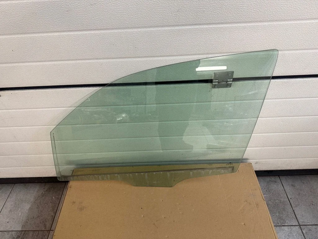 Front door window glass four-door – left