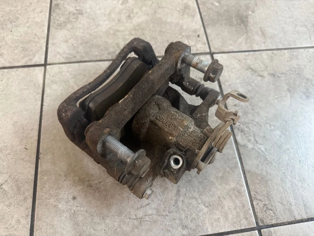 Rear brake caliper – rear left