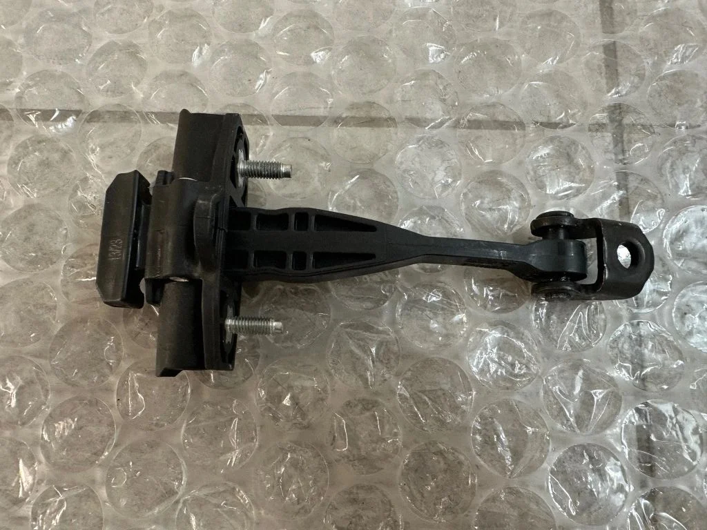 Rear door check strap stopper – Ford Ranger IV (2022-)