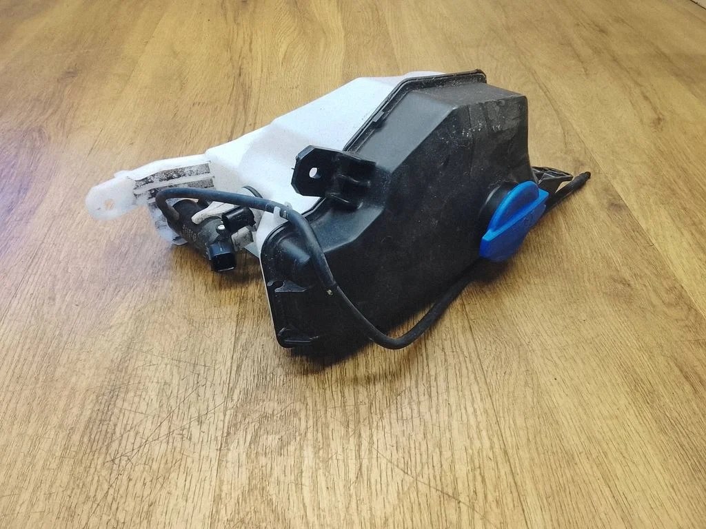 Windshield washer fluid reservoir/tank – KIA EV6 (2021-)