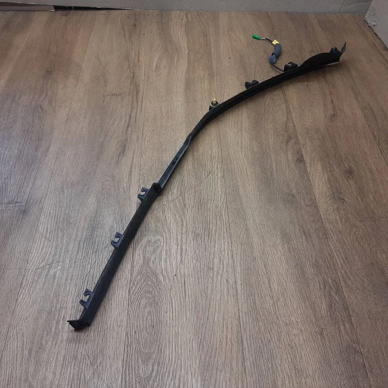 Kita bagažinės apdailos detalė