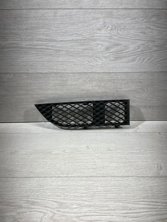 Front bumper lower grill 7135564