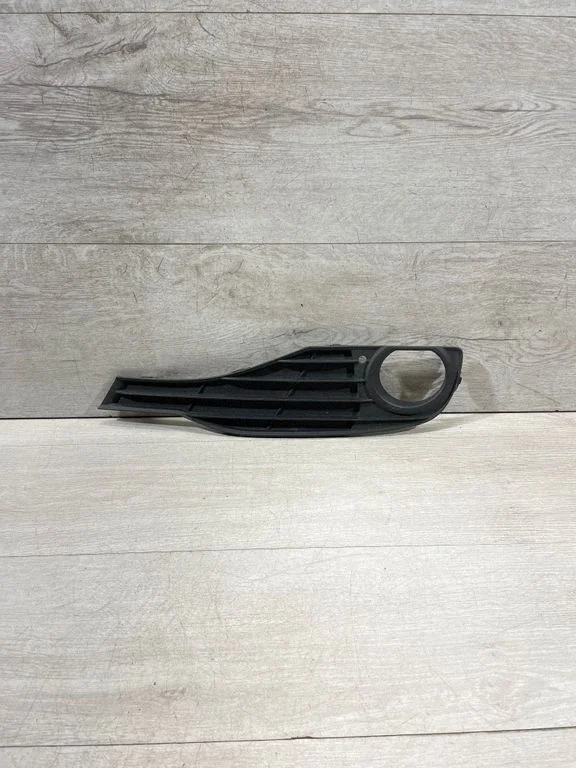 Front fog light trim/grill 7255365