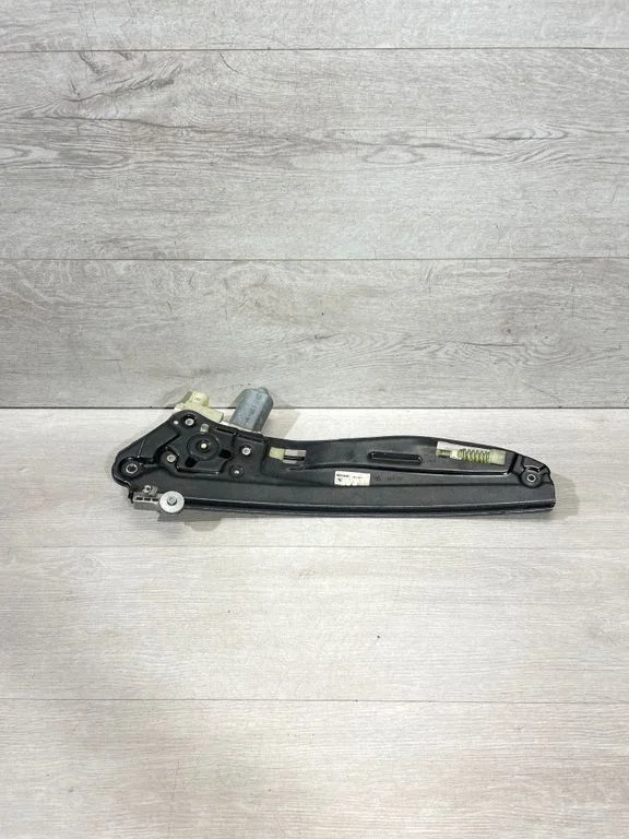 Rear door window regulator with motor 7202482