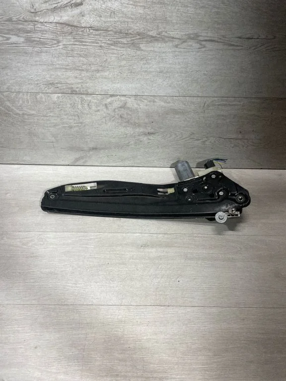 Rear door window regulator with motor 7202481