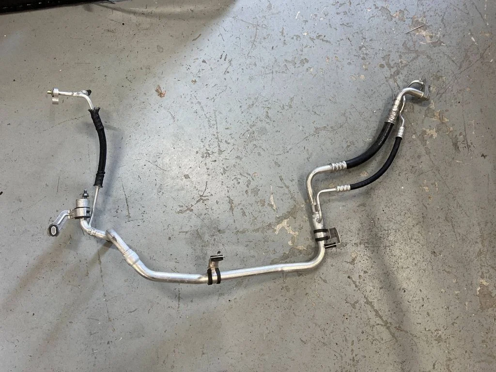 Air conditioning (A/C) pipe/hose P68277009AC