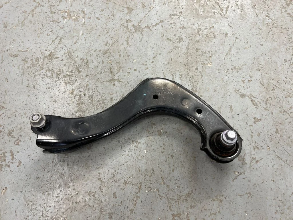 Rear upper control arm/wishbone – right