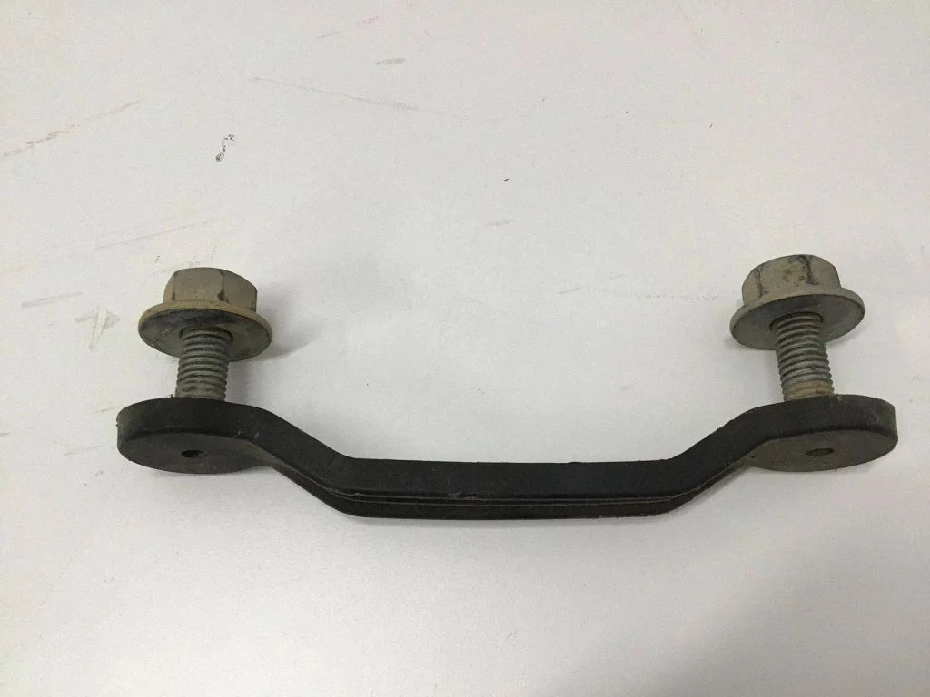 Front bumper mounting bracket FL3417B754AA