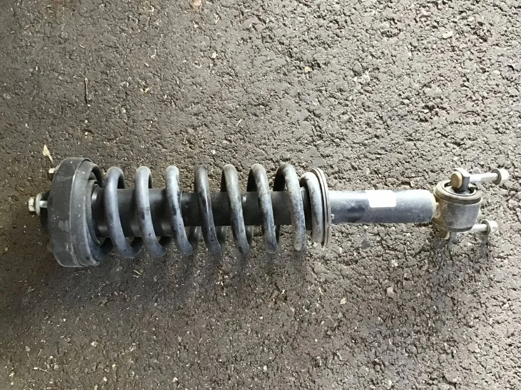 Front shock absorber with coil spring JL3418045