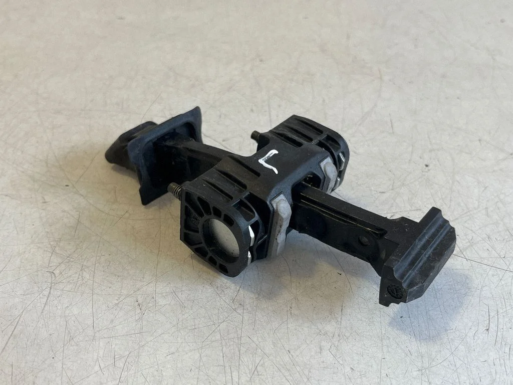 Front door check strap stopper – left