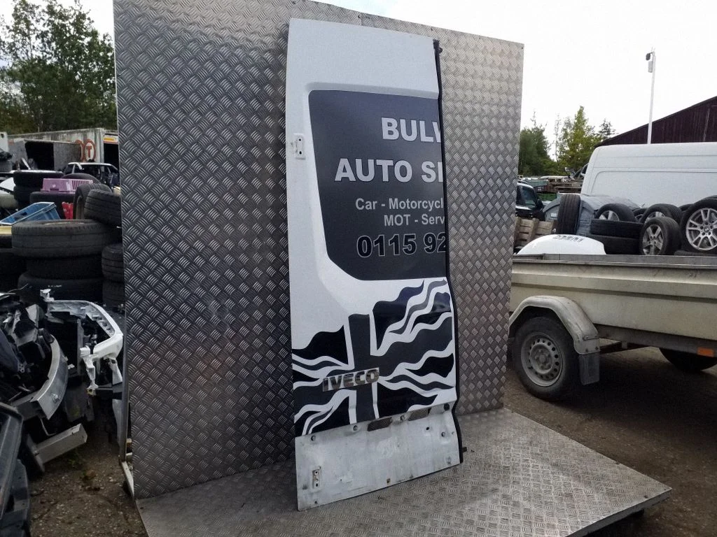 Back/rear loading door – left