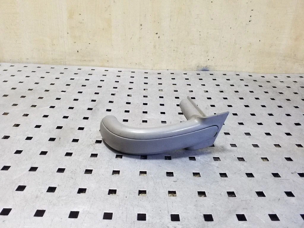 Front door interior handle trim – right