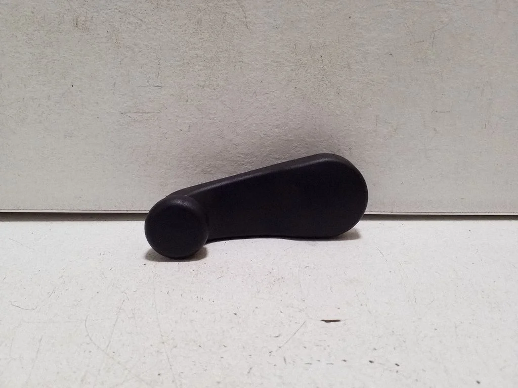 Rear door window winding handle – left