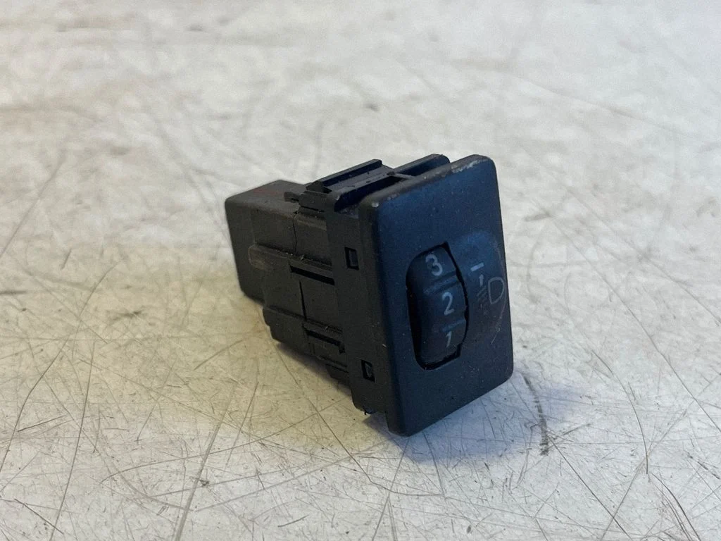 Headlight level height control switch