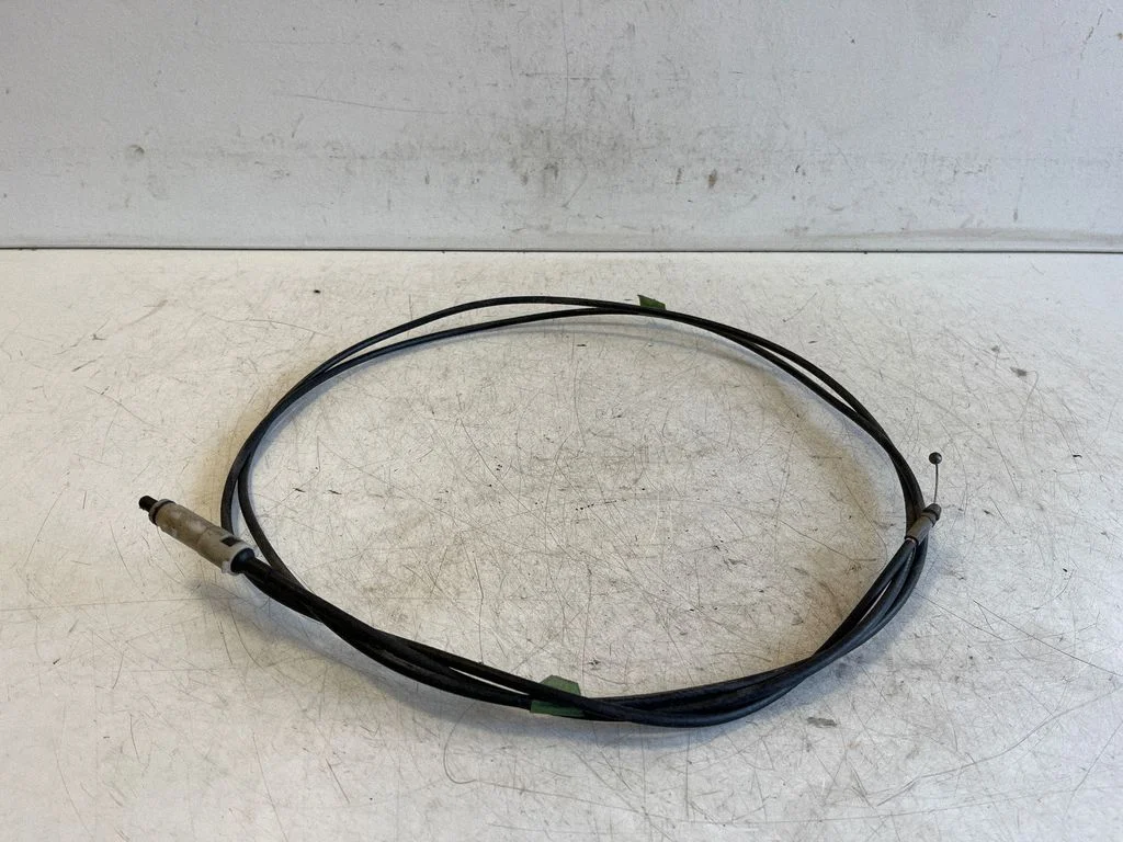 Fuel cap flap release cable