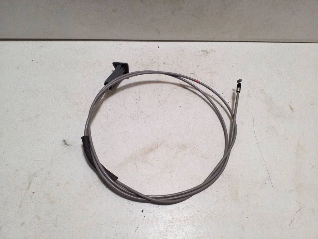 Fuel cap flap release cable