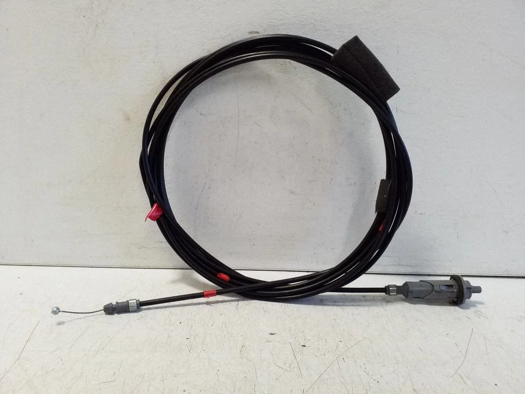 Fuel cap flap release cable