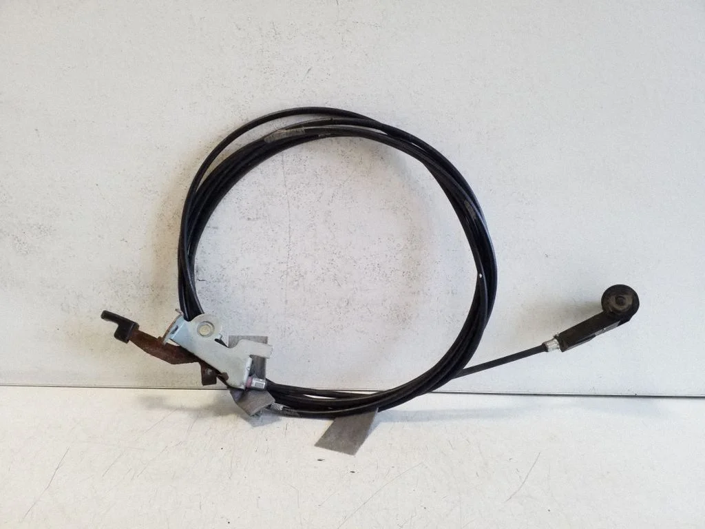 Fuel cap flap release cable