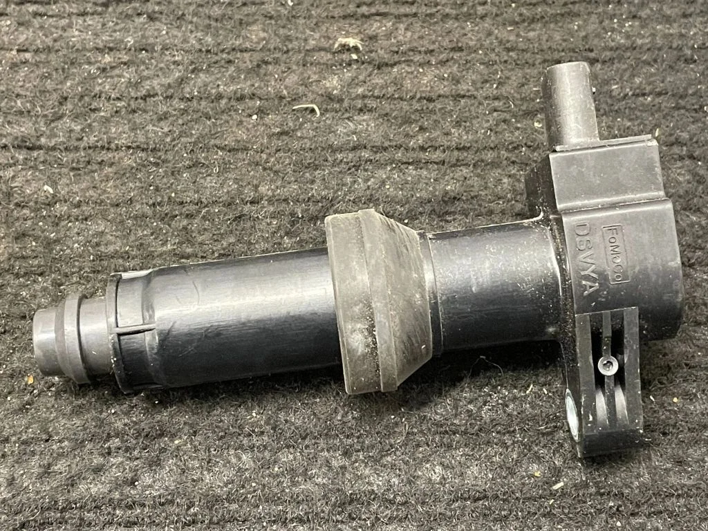 High voltage ignition coil LX6E12A375BA