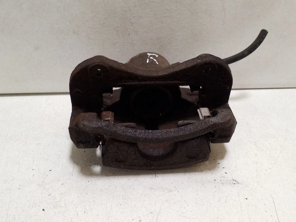 Front brake caliper – right