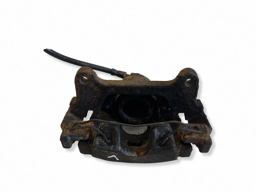 Front brake caliper – left