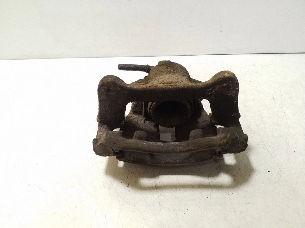 Front brake caliper – left
