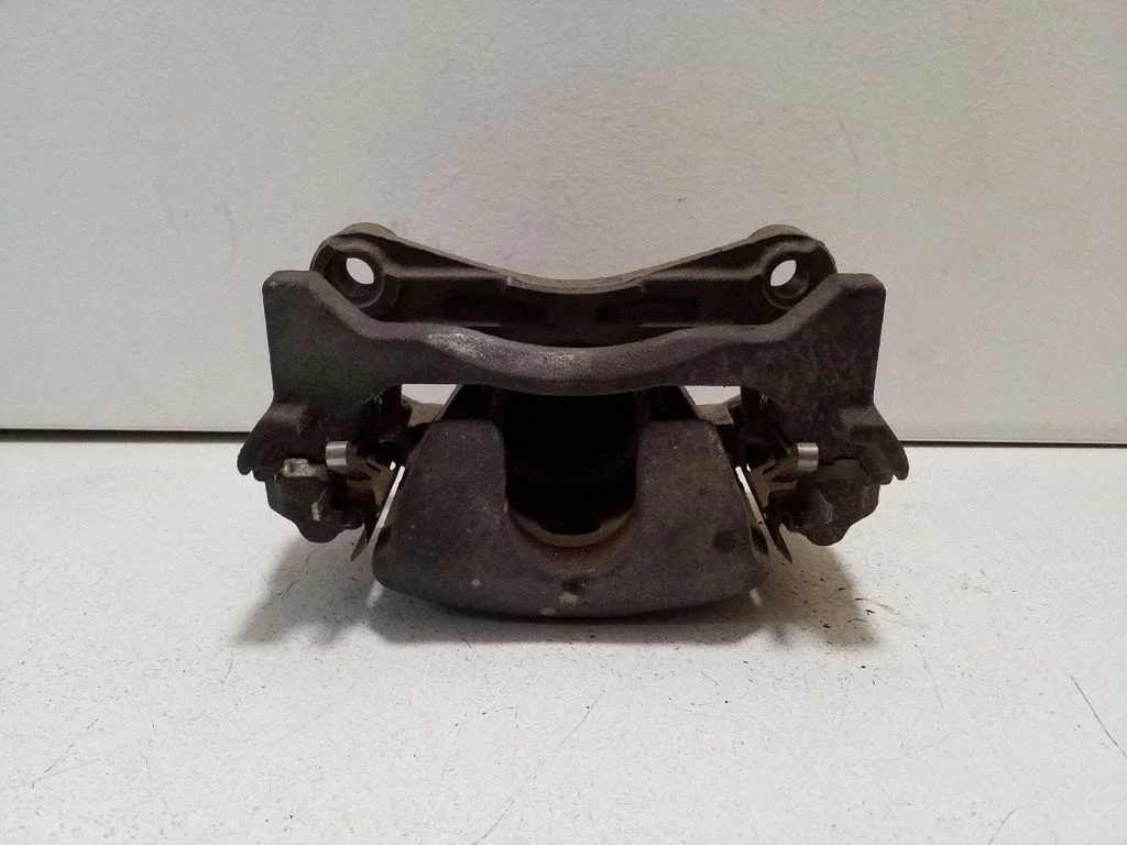 Front brake caliper – left