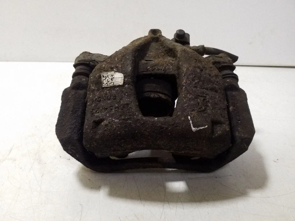 Front brake caliper – left