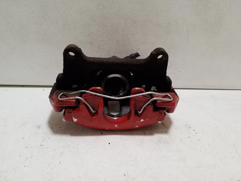 Front brake caliper – right