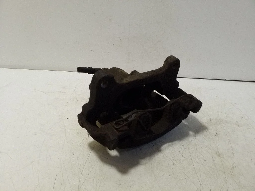 Front brake caliper – left
