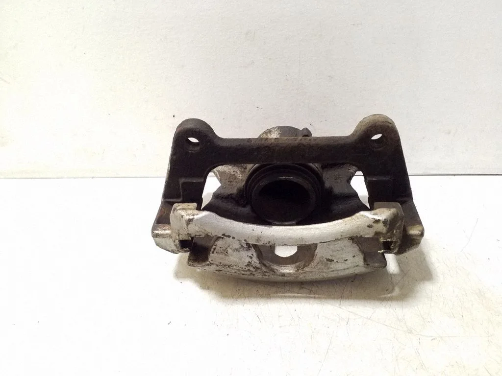 Front brake caliper – Volkswagen Passat B7 USA (2012-2019), left
