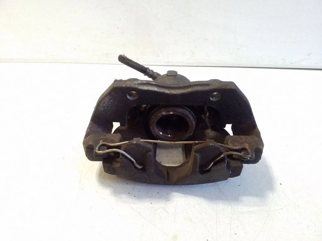 Front brake caliper – left