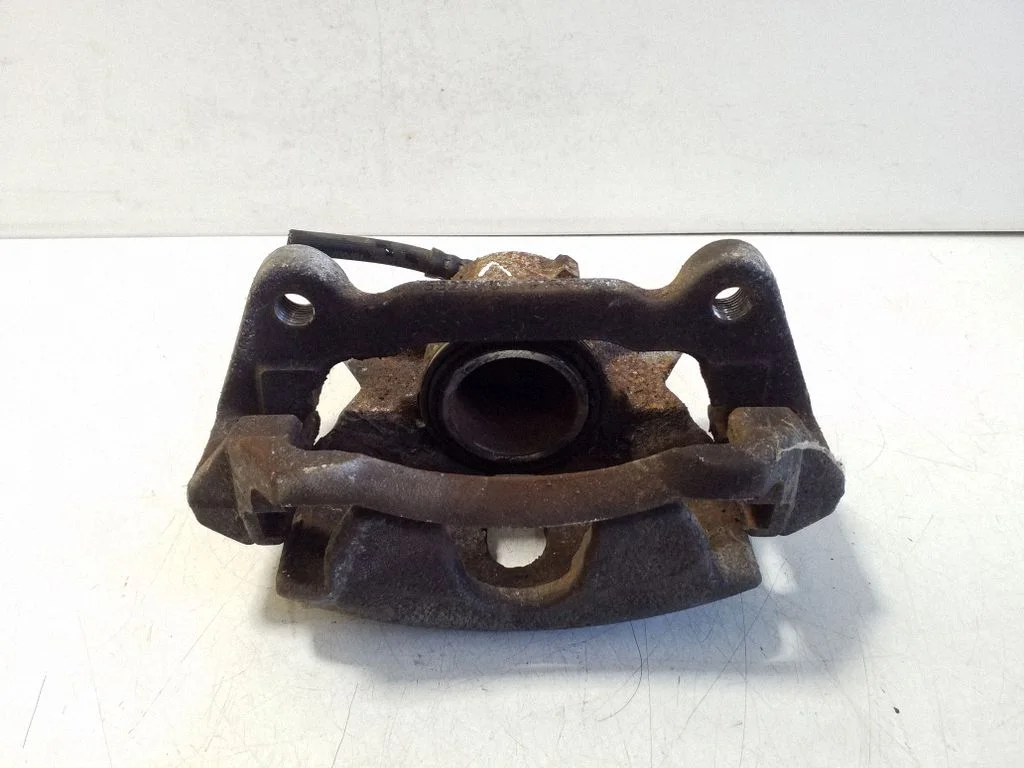 Front brake caliper – left