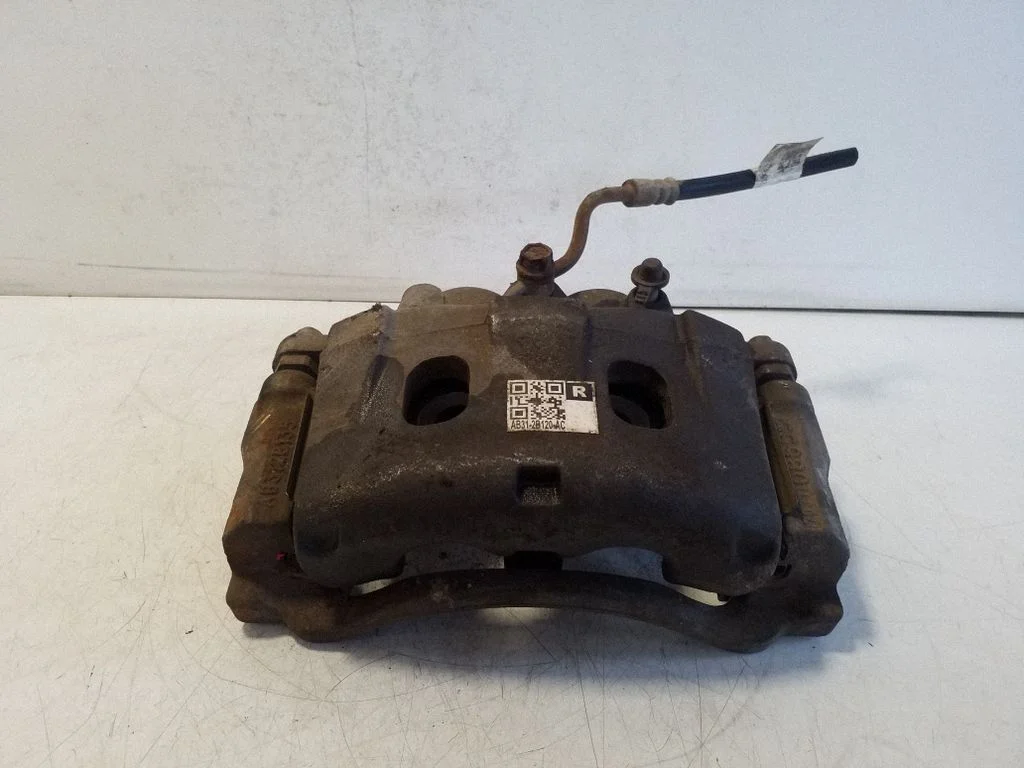 Front brake caliper AB312B120AC
