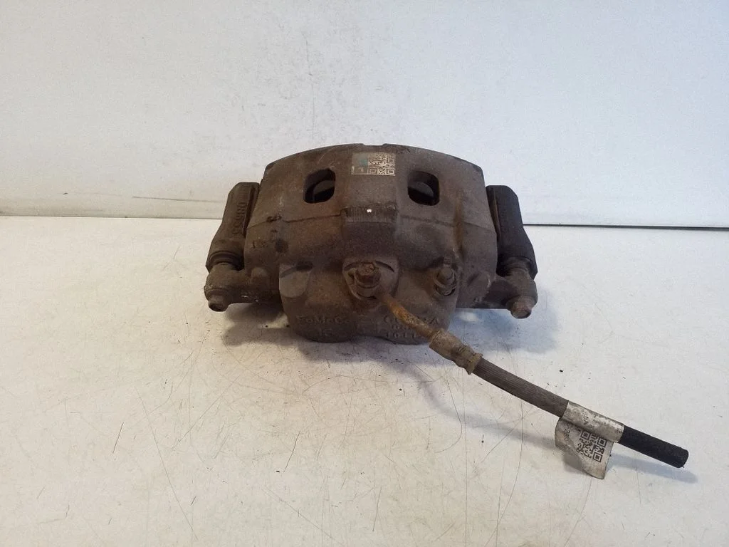 Front brake caliper AB312B121AC