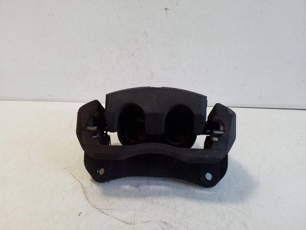 Front brake caliper – left