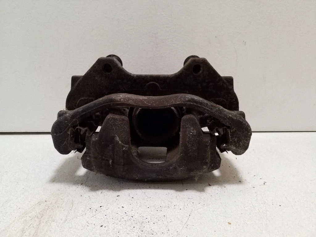 Front brake caliper – left