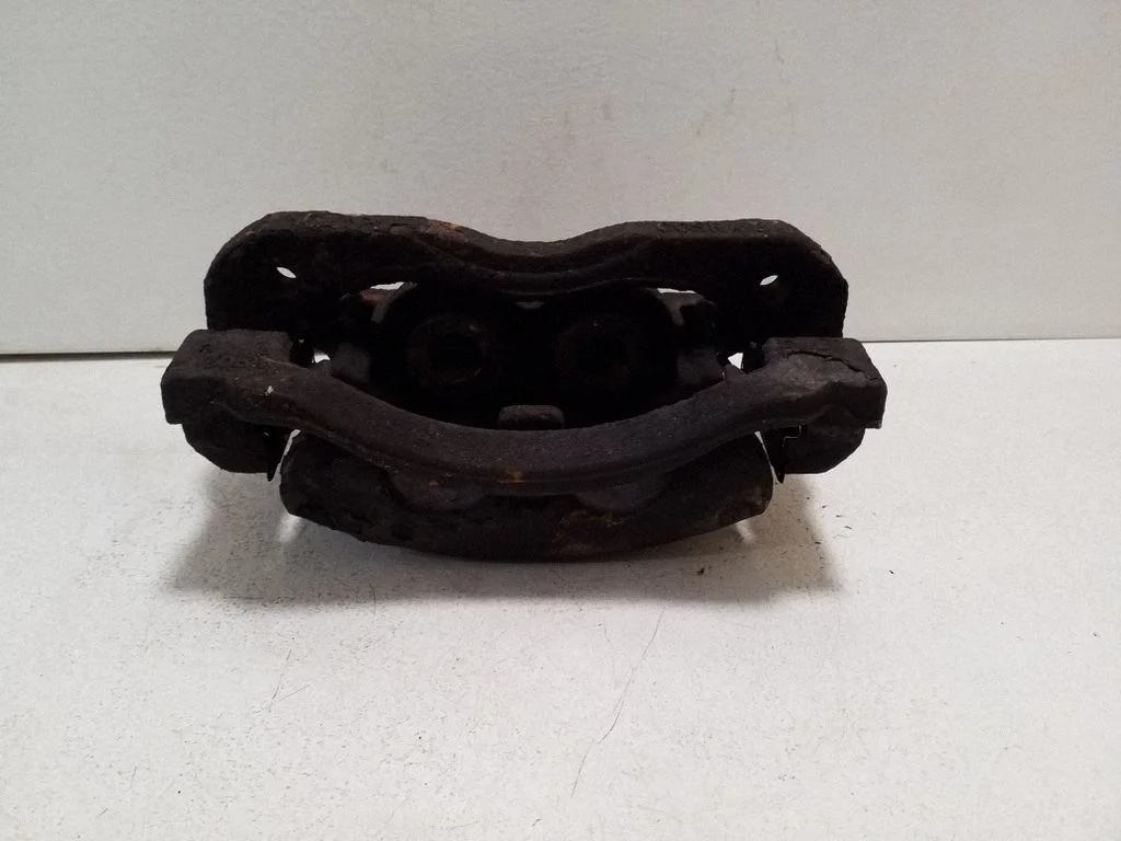 Front brake caliper – left