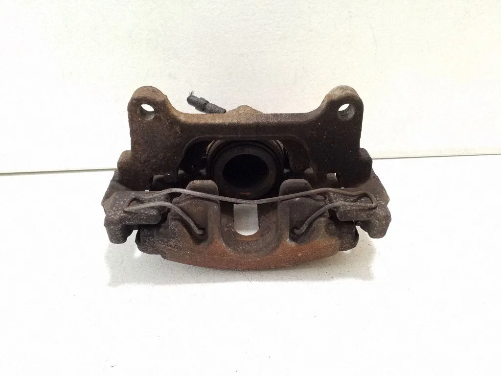 Front brake caliper – left