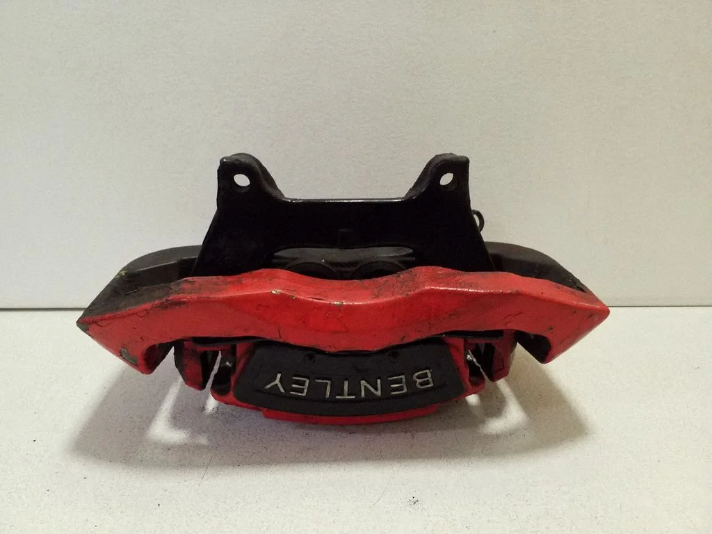 Front brake caliper – left
