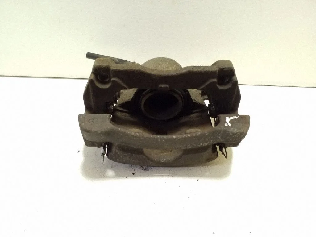Front brake caliper – left