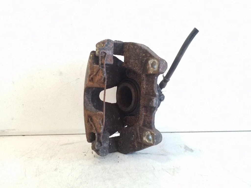 Front brake caliper – left