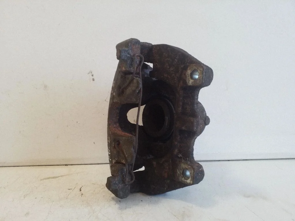 Front brake caliper – left