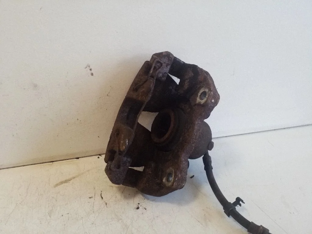 Front brake caliper – right