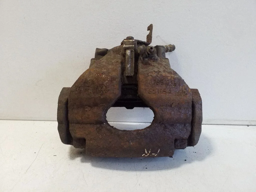 Front brake caliper – left