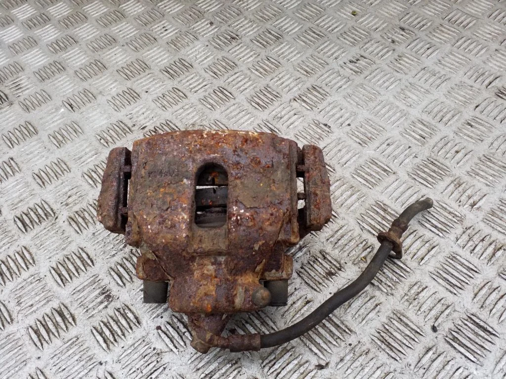 Front brake caliper – right