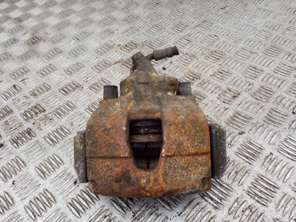 Front brake caliper – left