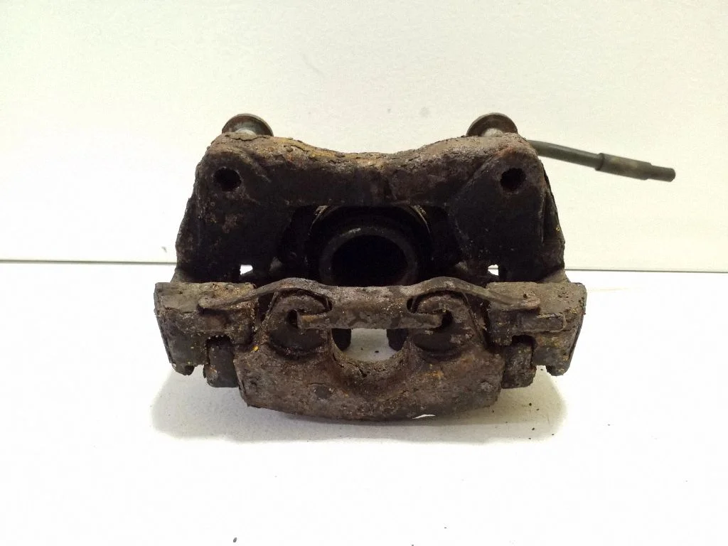 Front brake caliper – right