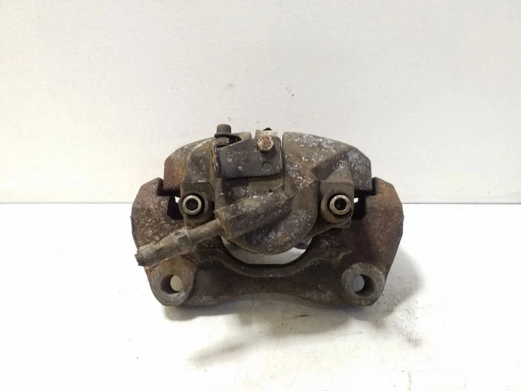 Front brake caliper – left
