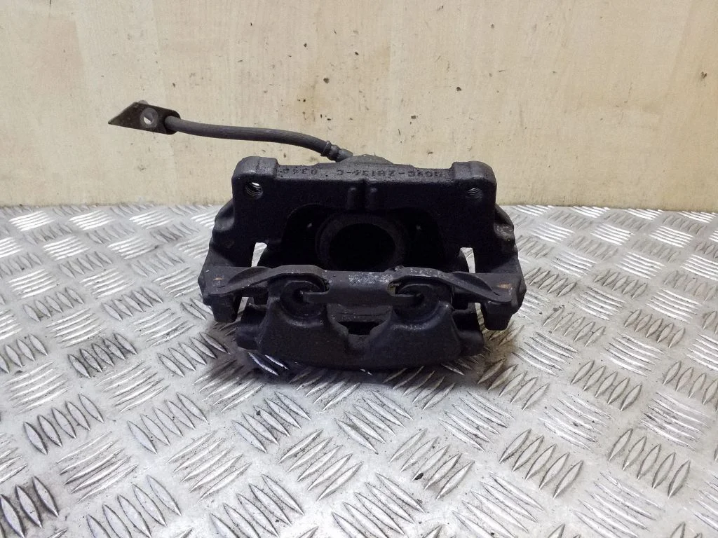 Front brake caliper DG9C2B302BA